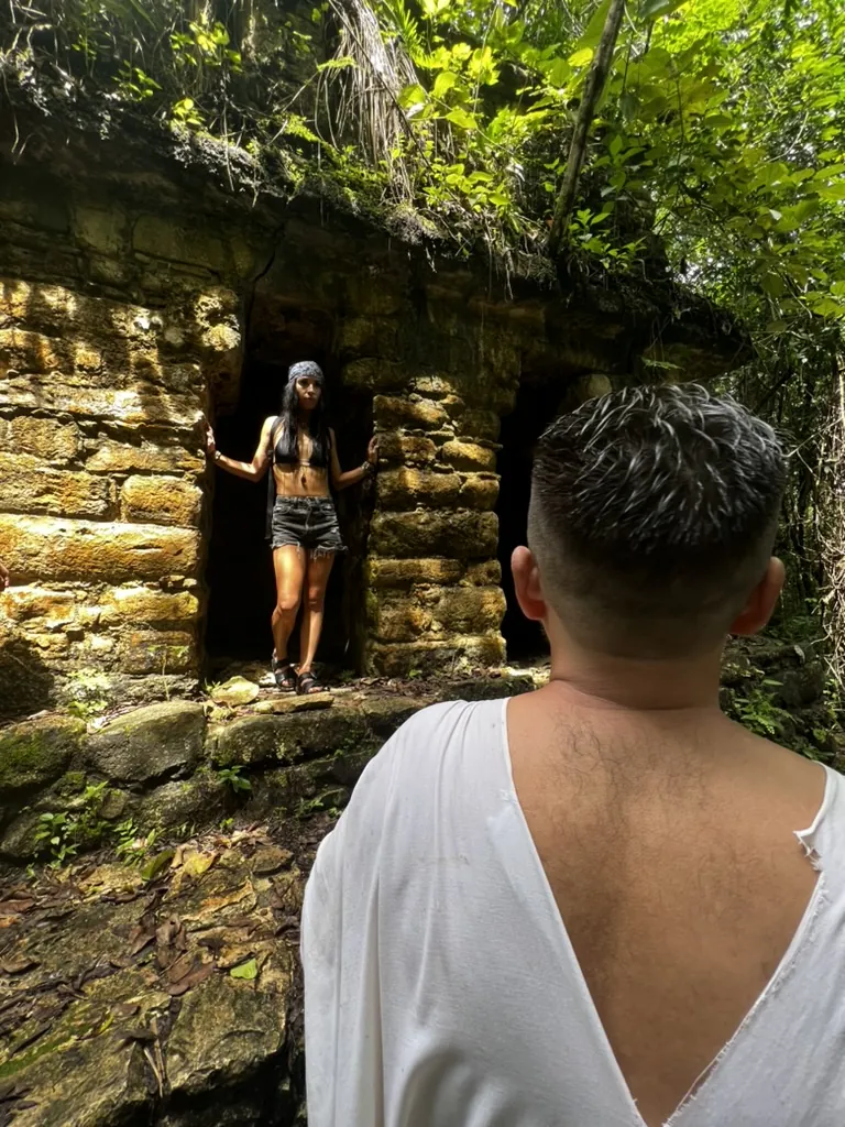 A jungle-covered Maya ruin doorway near Lacanjá